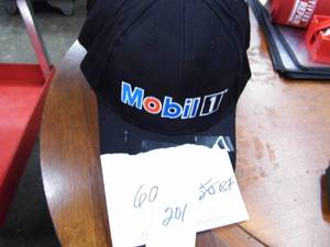 lot 201 image: Lot of 60 Mobil Baseball Caps