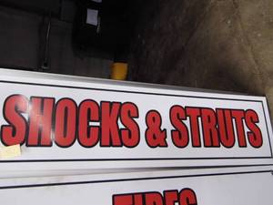 lot 213 image: Meal Shocks  Struts Sign