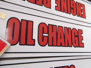 lot 238 image: Oil Change Metal Sign