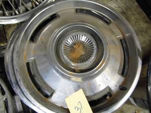 lot 37 image: Lot of 4 Hubcaps