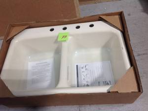 lot 73 image: Thermocast Beaumont Drop-In Acrylic 33 in. 4-Hole Double Bowl Kitchen Sink in Bone &nbspin good condition