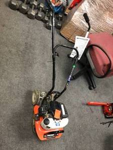 lot 205 image: Powermate 10 in. 43cc Gas 2-Cycle Cultivator In working condition