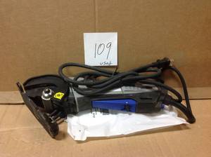 lot 109 image: Dremel Saw-Max 6 Amp Variable Speed Corded Tool Kit for Wood, Plastic and Metal with 2 Blades USED
