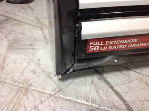 lot 111 image: Husky 26 in. W 4-Drawer Tool Chest in Gloss Black PLEASE SEE PHOTO DAMAGE