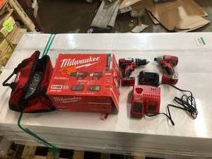 lot 101 image: Milwaukee M18 18-Volt Lithium-Ion Cordless Drill DriverImpact Driver Combo Kit (2-Tool) w(2) 1.5Ah Batteries, Charger, Tool Bag in good conditions