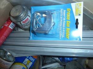 lot 479 image: Box of Misc. Grease Gun Holder, Pipe Insulation & Brush