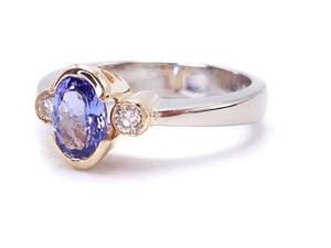 lot 23 image: Mesmerizing Tanzanite and Diamond Estate Ring in 14k White Gold $2850