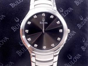 lot 37A image: Mens Bulova 12 Diamond Black Face Watch $500