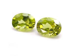 lot 35A image: (2) 2.91 Carat Oval Cut Natural Peridot Gemstones Loose