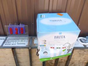 Brita under sink water filtration system. Appears new in box. As shown.