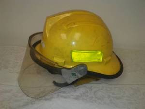 lot 12 image: Bullard Fire Helmet  Authentic, yellow.