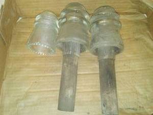 lot 76 image: Insulator wood mounts & 3 insulators.