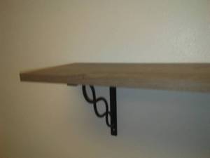 lot 24 image: 2 shelves with metal brackets
