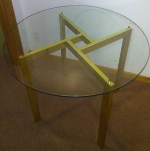lot 83 image: Heavy Glass Top Gold Table, 36 D x 29 tall