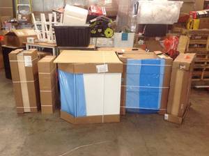 lot 63 image: PALLET OF ASSORTED HAMPTON BAY CABINETS in good conditions