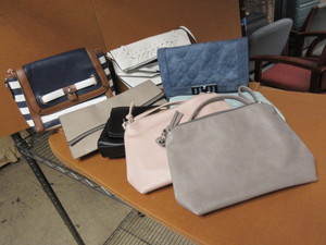 lot 723 image: EIGHT LIKE NEW PURSES