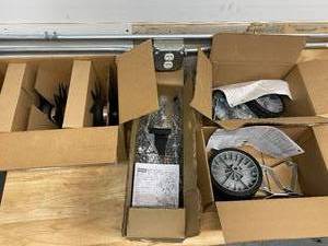 lot 51 image: Lot of 4 boxes Lawn Equipment attachments
