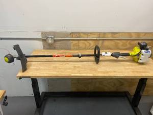 lot 9 image: RYOBI 25cc 2-Cycle Attachment Capable Full Crank Curved Shaft Gas String Trimmer