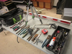 lot 835 image: HAND TOOLS, SAWS, WRENCHES, 4 LEVEL, SOCKETS, COSCO STEP STOOL, DRILL BITS, TRI-POD, MORE