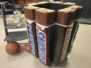 lot 841 image: SNICKERS DISPLAY CASE, SPALDING BASKETBALL, FRANKLIN FOOTBALL, WOOD HIGHCHAIR CHAIR.