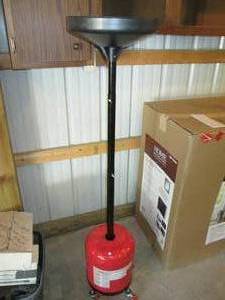 lot 42 image: 5 Gallon Portable Oil Dolly...