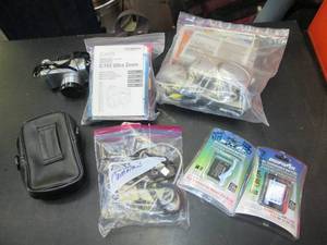 lot 229 image: (2) Camera With Batteries and Other...