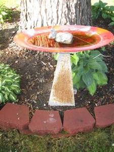 lot 240 image: GlassSteel Bird Feeder With Frog Rock