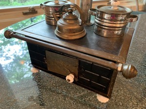 lot 3 image: Antique Toy Metal Stove with Accessories
