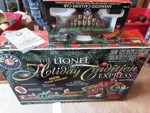 lot 64 image: The Lionel Holiday Traditional Express (Only Goes In Reverse)