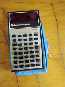 lot 174 image: Texas Intsrument Calculator