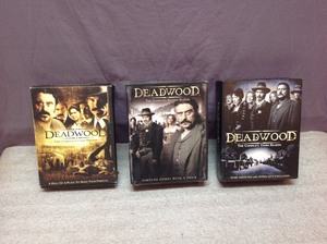 lot 121 image: Deadwood DVDs 3 Complete Seasons