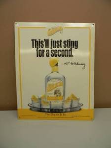 lot 43 image: VINTAGE DR. McGILLICUDDYS TIN SIGN - THISLL JUST STING FOR A SECOND - APPROX 16 BY 21 - SEE PICTURES