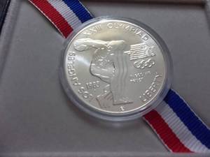 1983 Uncirculated Olympic Silver Dollar With POA. .900 Fine.  1984 Los Angeles