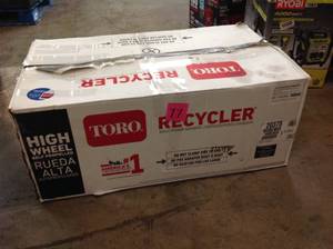 lot 11 image: TORO 22 in. Kohler High Wheel Variable Speed Gas Walk Behind Self Propelled Lawn Mower