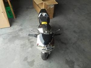 lot 4 image: Velocit 50cc Pocket Motorcycle