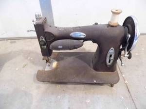 lot 25 image: White Sewing Machine