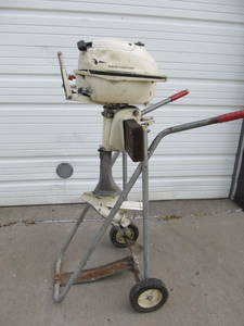lot 102 image: Vintage JOHNSON Seahorse 3hp Outboard Motor wStand