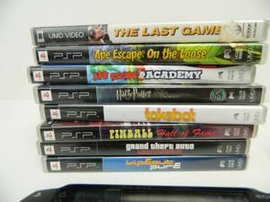 lot 193 image: Working Sony PSP Handheld Video Game System wGames & Charger