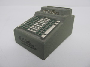 lot 177 image: Vintage RC ALLEN Adding Machine Advertising Paperweight