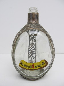 lot 181 image: Vintage Sterling Silver on Glass Haig & Haig Pinch Whiskey Bottle