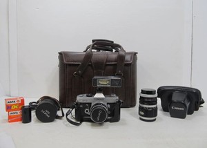 lot 216 image: Vintage CANON QL FT Film Camera wZoom Lens Accessories & Case