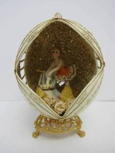 lot 258 image: Ornate Ballerina in Egg Display Statue