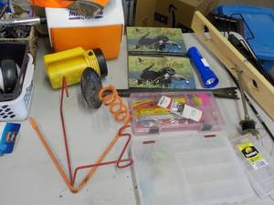 lot 41 image: Fishing Supplies and Camo Clothing...