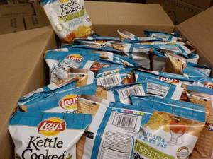 lot 180 image: Case of 64 - 1.375 oz bags Lays Ket...