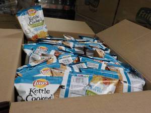 lot 184 image: Case of 64 - 1.375 oz bags Lays Ket...