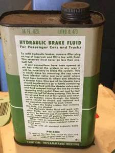 lot 17 image: Varcon Hydraulic Brake Fluid (collectible oil tin can)