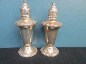 lot 34 image: Sterling Sliver Shakers