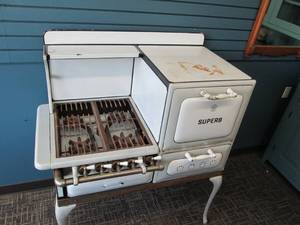 lot 66 image: Vintage Cast Iron Gas Stove