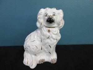 lot 137 image: Porcelain Dog Statue