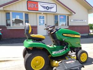lot 1 image: John Deere x320 lawn mower